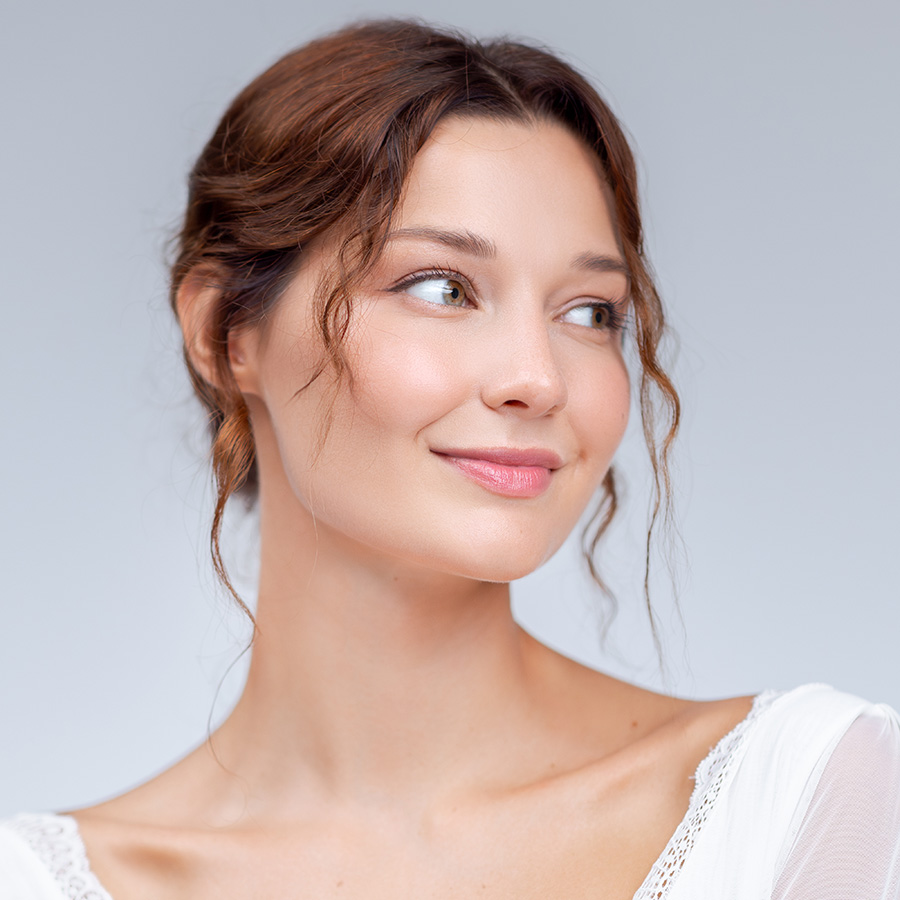 Beautiful woman in a white lace shirt